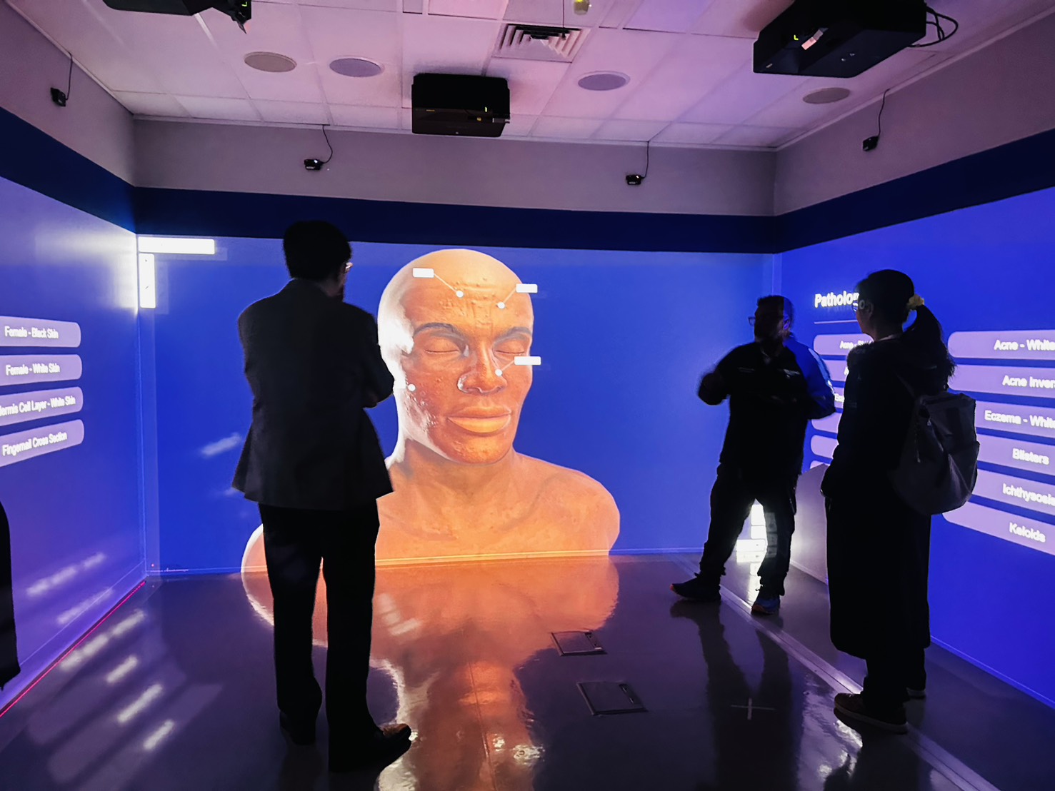 Figure 10: Dr. Navin Naidoo introduces Australia's first "Blended Learning Interactive Simulation (BLIS) Suite" and demonstrates its educational applications.
